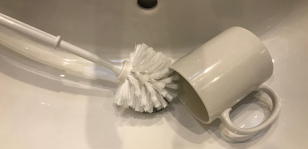 cream toilet brush
