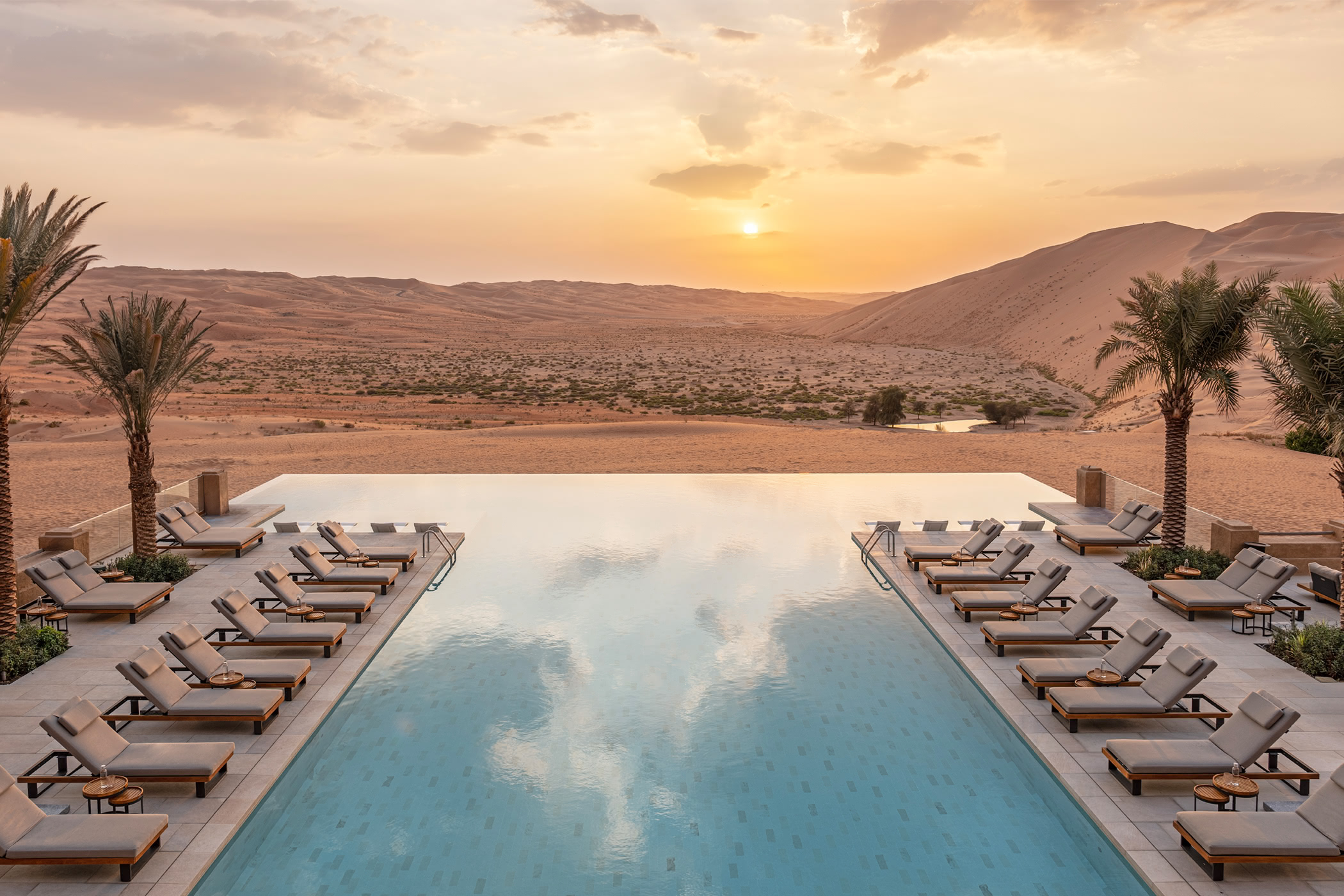 Qasr Al Sarab Desert Resort by Anantara Pool At Sunset