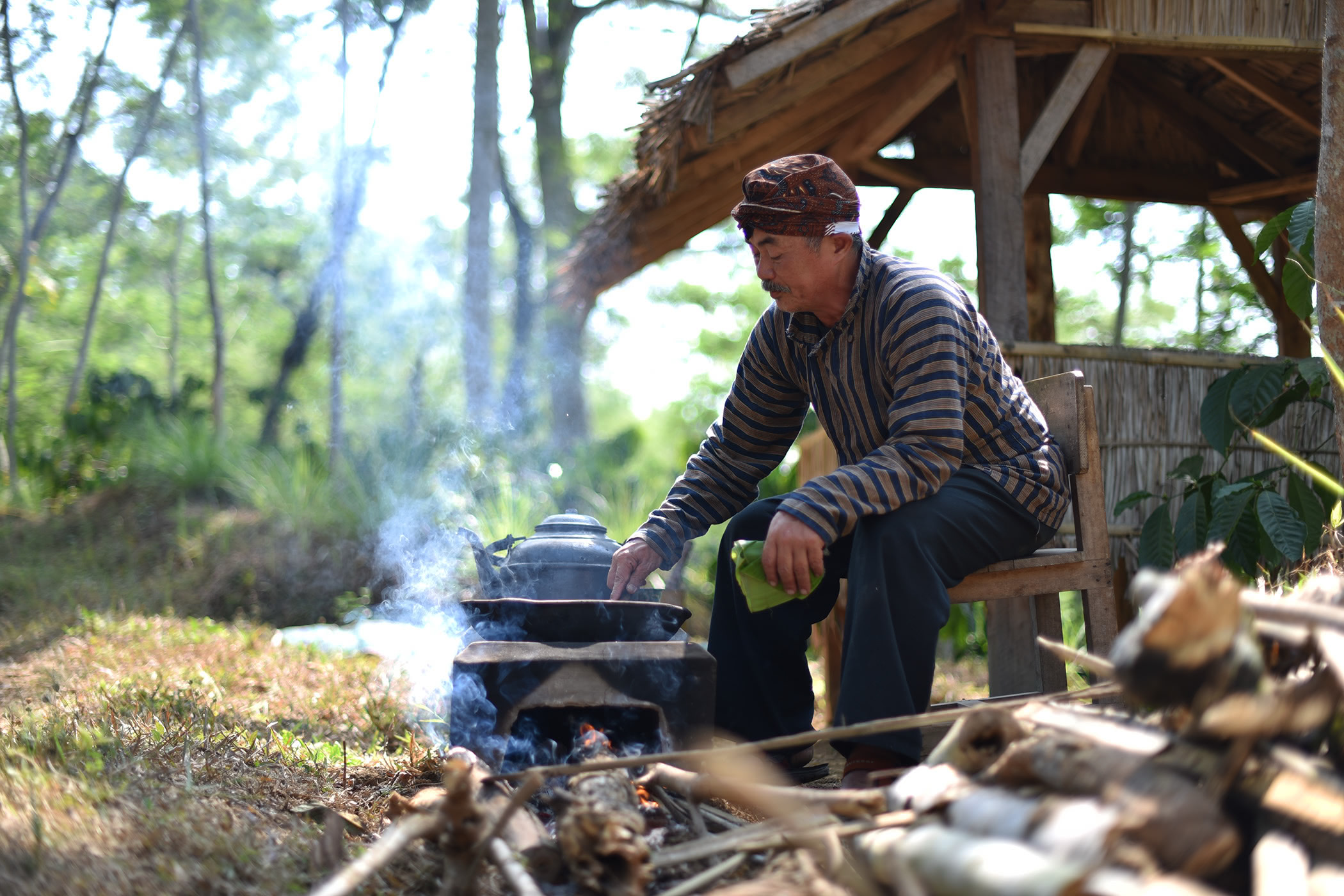 Traditional Roasting Coffee Beans at Kawisari Coffee Plantation